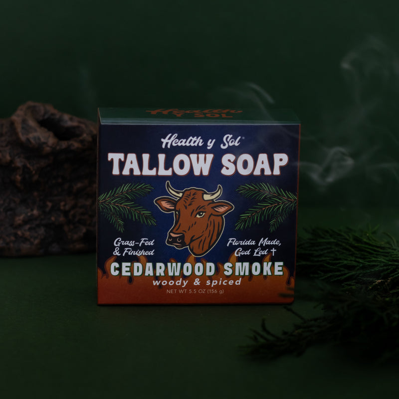 soap with cedarwood on green background